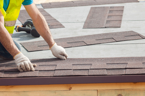 Roofer Laying Roofing - Roofing Companies - Get Your Quote
