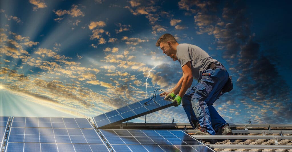 guy installing solar panels