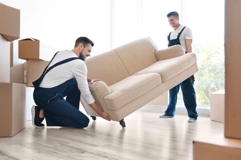 men moving a sofa