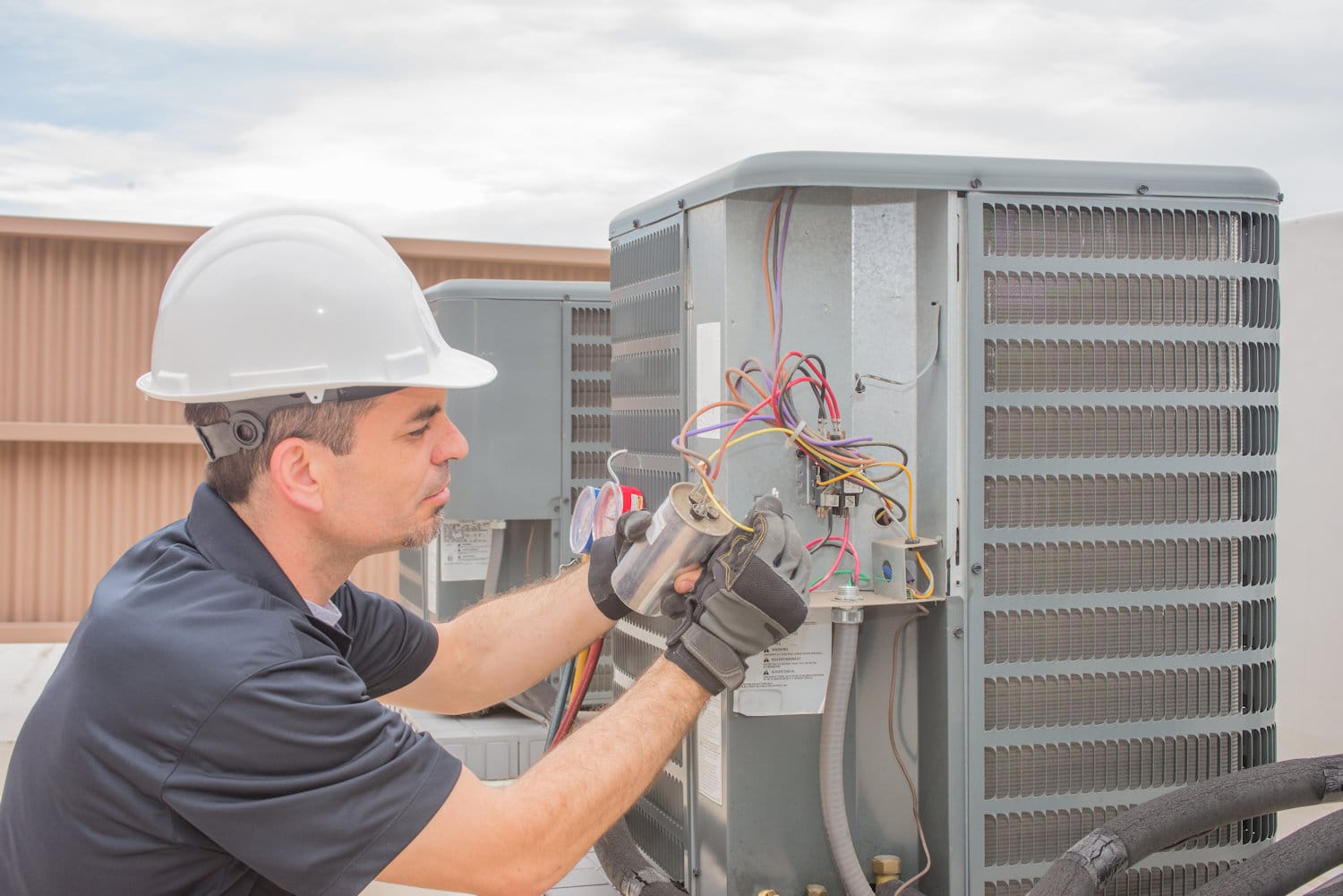 HVAC Repair Man Fixing AC - Find Contractors - Get Your Quote